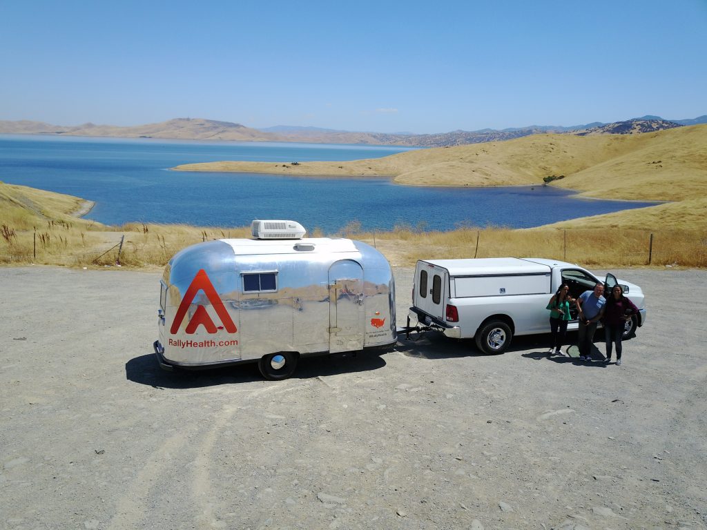 an Airstream photo booth hooked to a truck