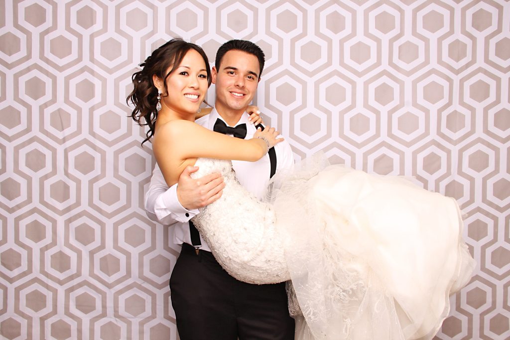 Bride and Groom at a Wedding Photo Booth